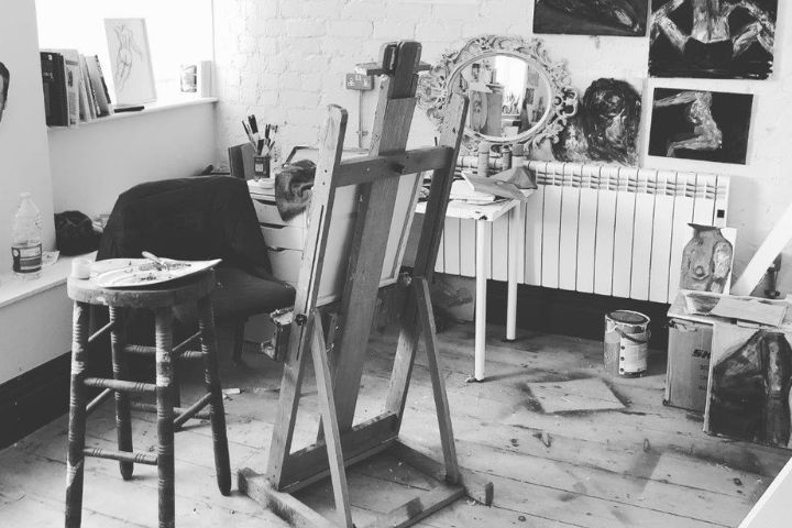 Interior of Market House Studios showing a canvas and artwork on the wall.